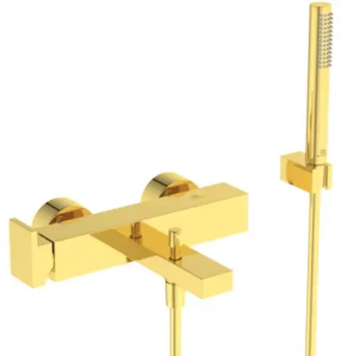 Ideal Standard Badearmatur in gebürstetem Gold mit zwei regulierenden Hebeln und einer Handbrause. Kompakte Bauweise für moderne Badezimmer.